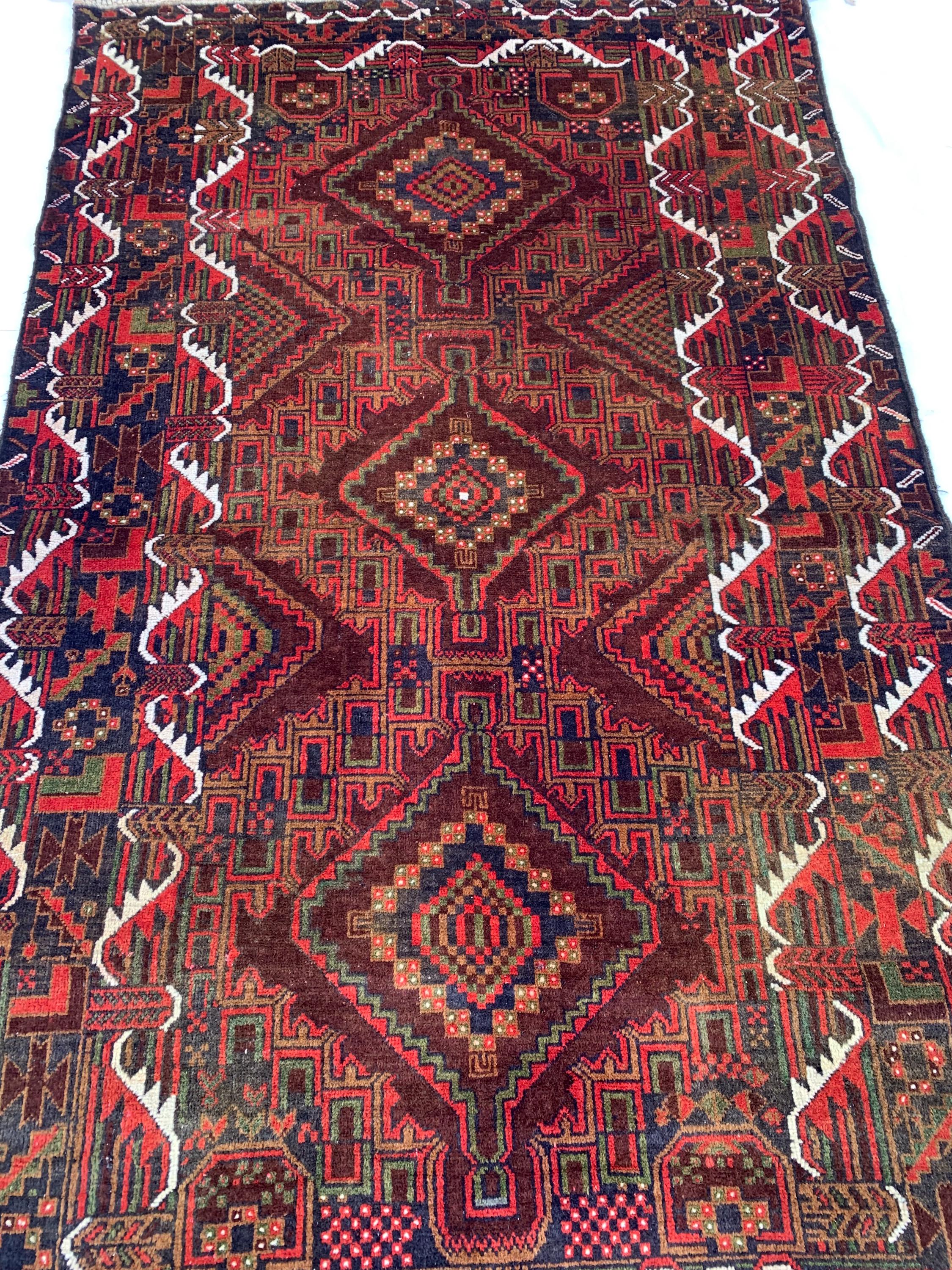 4x7 Vintage Baluchi Rug – Handmade Wool Tribal Carpet with Intricate Symbolic Patterns in Brown, Rust, and White, Living Room Rug 195x113