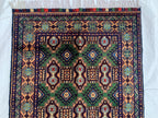 5x3 Geometric Maranus Rug – Hand-Knotted Afghan Tribal Carpet 5.4x3.4 ft | Vintage Wool Area Rug | Bold Green and Peach Bohemian Home Décor