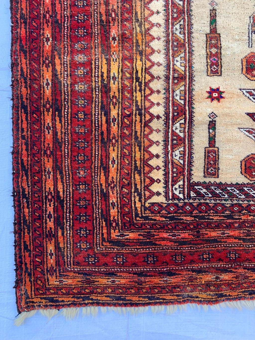 3x4 Vintage Afghan War Rug–Handmade Wool Tribal Carpet with Intricate Symbolic Patterns in Beige and Deep Red, Collectible Rug for Auction