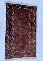 4x7 Vintage Baluchi Rug – Handmade Wool Tribal Carpet with Intricate Symbolic Patterns in Brown, Rust, and White, Living Room Rug 195x113