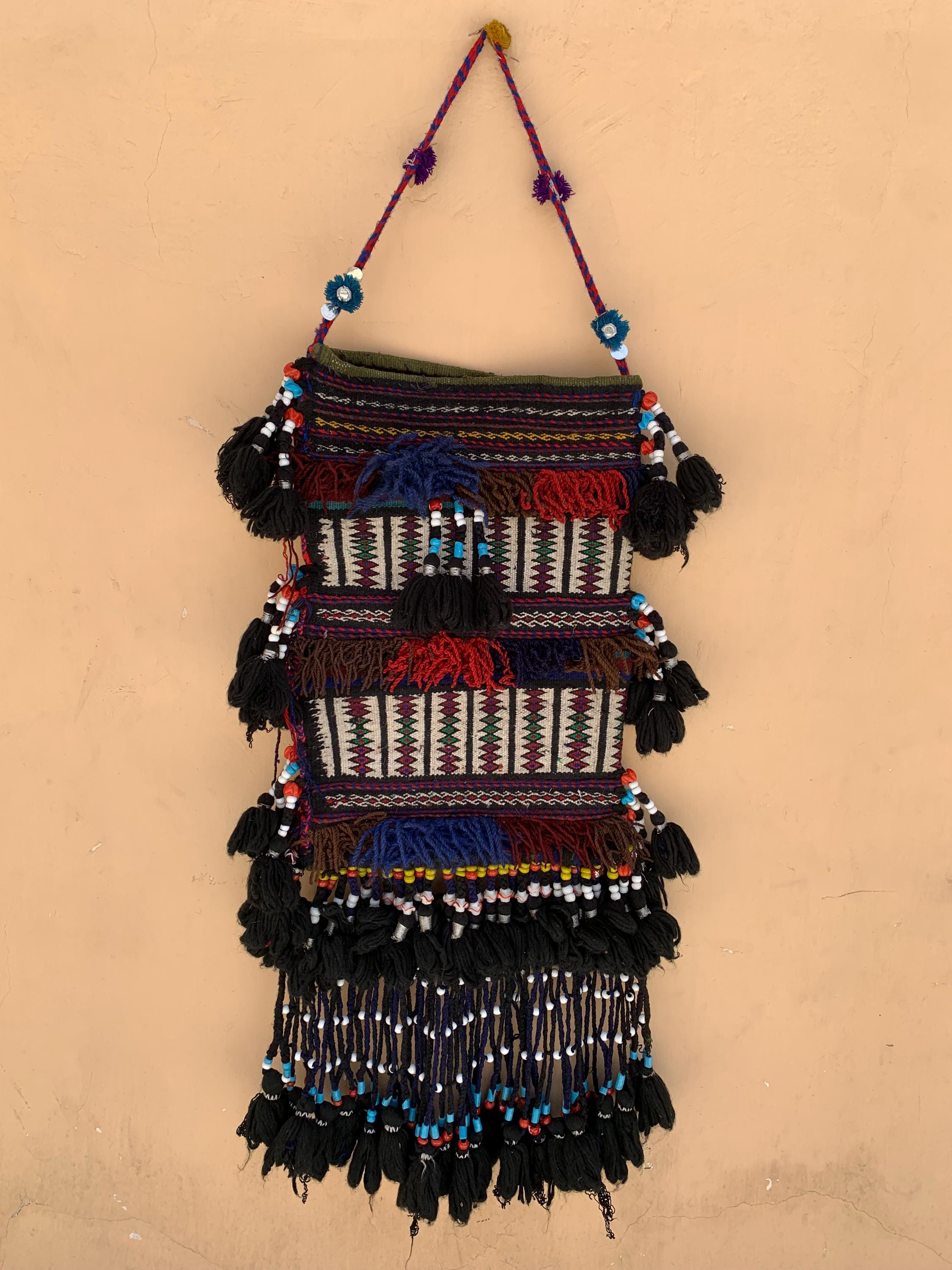 Wall Hanging Handmade Tribal 2.10x1.1 ft – Vintage Boho Textile Art, Ethnic Wool Decor, Colorful saddlebag Baluchi Textile with Tassels