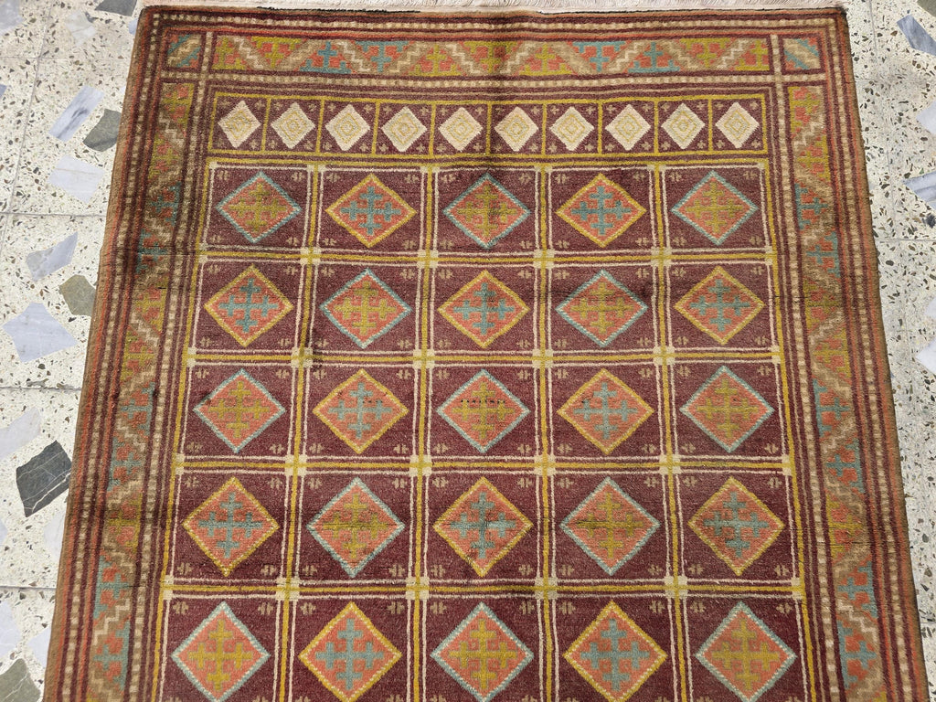 Vintage Afghan Wool Rug: 5.9 x 4.1 ft, Geometric Tribal Design