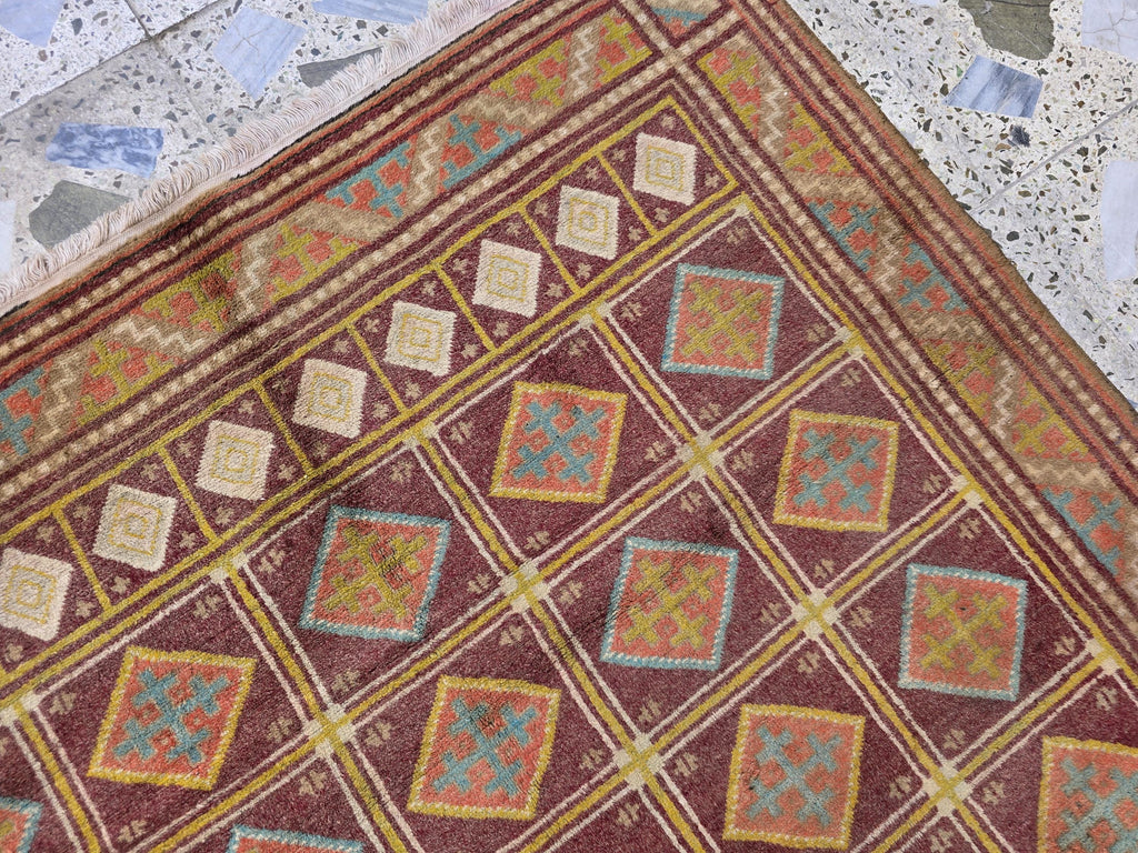Vintage Afghan Wool Rug: 5.9 x 4.1 ft, Geometric Tribal Design