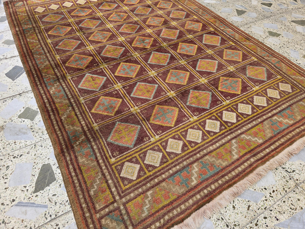 Vintage Afghan Wool Rug: 5.9 x 4.1 ft, Geometric Tribal Design